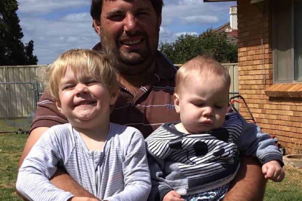 Ben Smith and two of his children. Photo: GoFundMe.