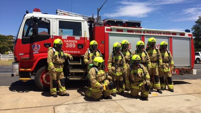 OPEN INVITATION: Members of Harden Fire and Rescue team 389 ready for action outside the Harden Fire and Rescue Headquartera on Albury Street.