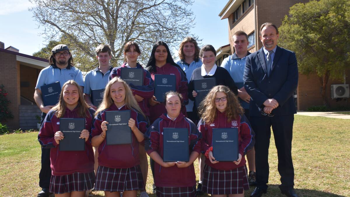 Final farewell: Murrumburrah High School's Year 12 group pose for a final photo in their uniforms with Headmaster Dale Rands. Picture: Jody Potts