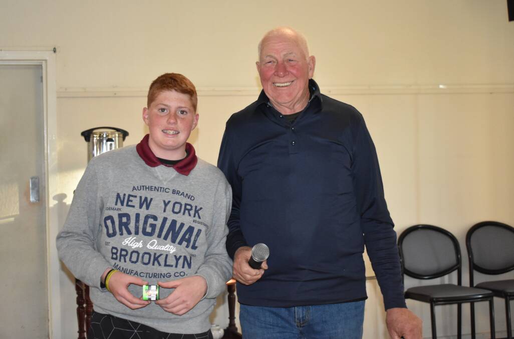Jack Glover was in fine form on the weekend taking after, and beating his Club Champion father Ben. Jack was presented his prize by Ron Page. Picture: Jody Potts.