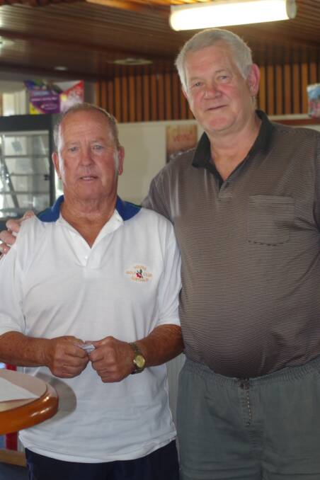 B Grade Winner  of the Monthly Medals, Larry Stephenson is presented his prize by Kevin Hoppe on Saturday at the Harden Country Club Picture: Jody Potts