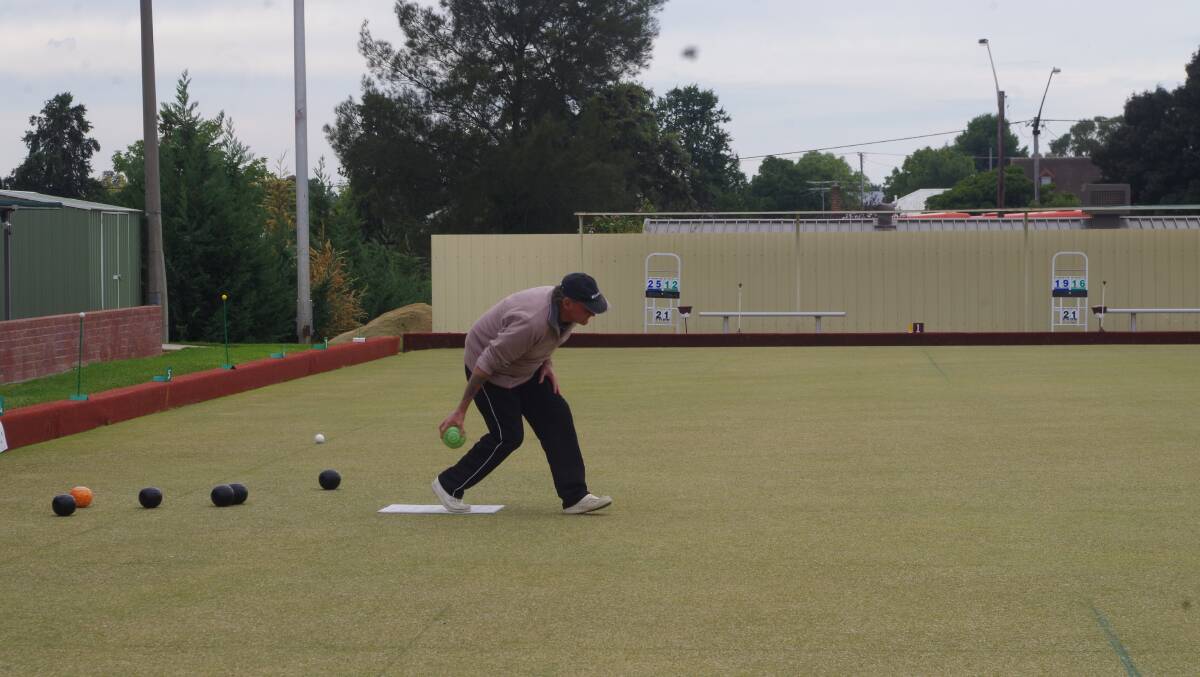 SHOT: Jesse James makes a beautiful shot at Mufti Bowls on Sunday morning at the Harden Bowls Club. He was part of the winning team Sunday afternoon.