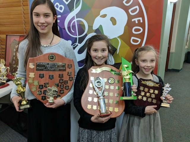 Meg, Rachel and Abbey Roberts from Jugiong with their prizes from the Parkes Eisteddfod. Picture: contributed