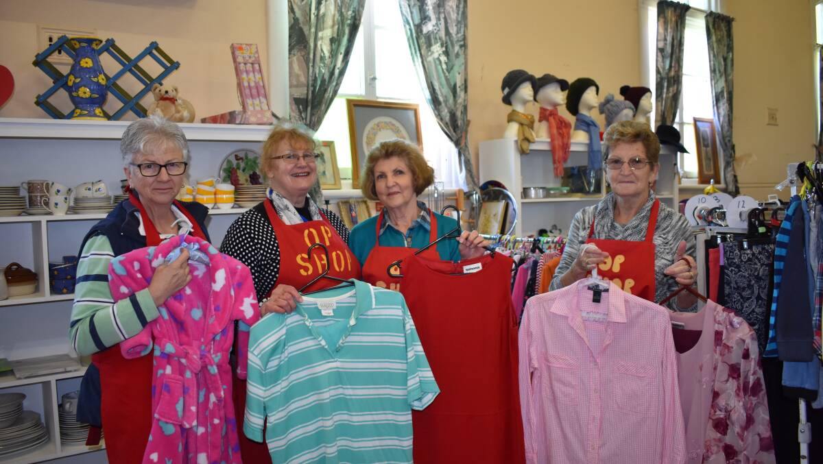 Anglican Op Shop ladies Sue Chesworth, Anne Whitty, Jan Gibson and Marg O'Keeffe show some of their pre-loved summer garments. Picture: Jody Potts