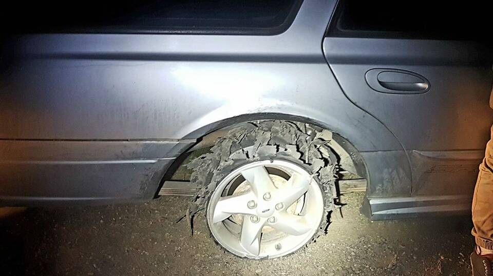 Police stopped a man for a RBT, then noticed the back tyre was missing.