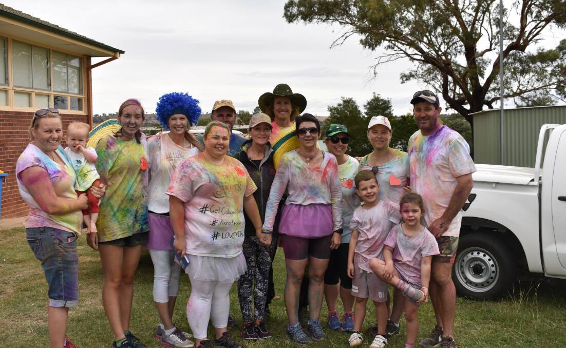 Event organiser Kayla Stevens in the centre with friends and family supporting Donna Adam for the Colour Run. Picture: Jody Potts