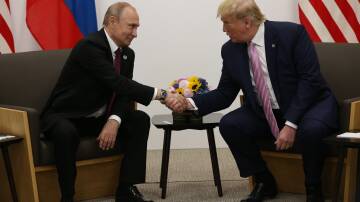 Strongmen united - Vladimir Putin and Donald Trump at the G20 summit in Osaka, Japan, 2019. Picture: Getty Images