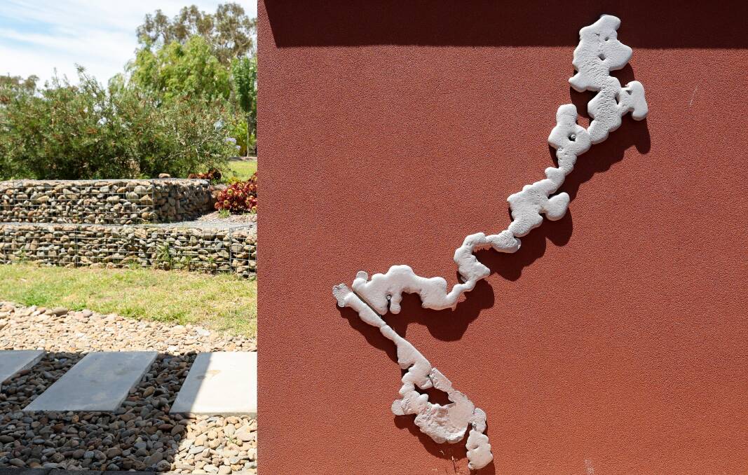 Around Banksia Park there are sculptural pieces of molten metal, which were picked up in the days after the fire. Picture by Adam McLean Around Banksia Park there are sculptural pieces of molten metal, which were picked up in the days after the fire. Picture by Adam McLean