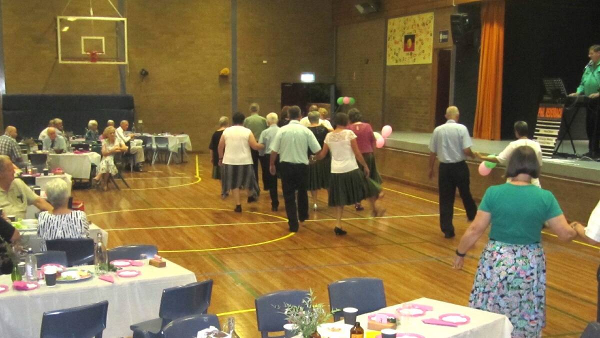 Some of the action at one of the recent Old Time Dances with music by Phil Redenbach.