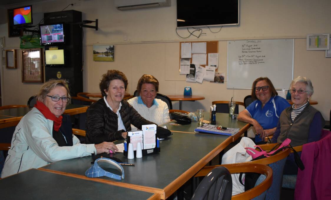 DAY ON THE GREEN: Janice Grey, Alexa Preston, Val Henderson, Marj Manwaring and Pat Walker relax in the clubhouse. Picture: Jody Potts