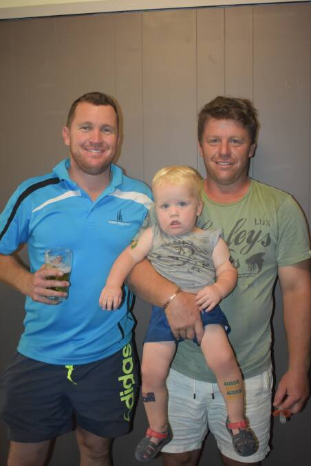 BLOKES DAY OUT: Nathan Schofield and Andrew Jones with Jones's son, Artie, after a great day of golf recently. Picture:Jody Potts