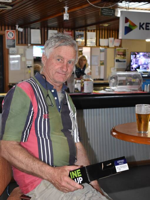 HARD WORD: Rick Preston enjoys a cool beverage after a round of golf last week. Picture: Jody Potts