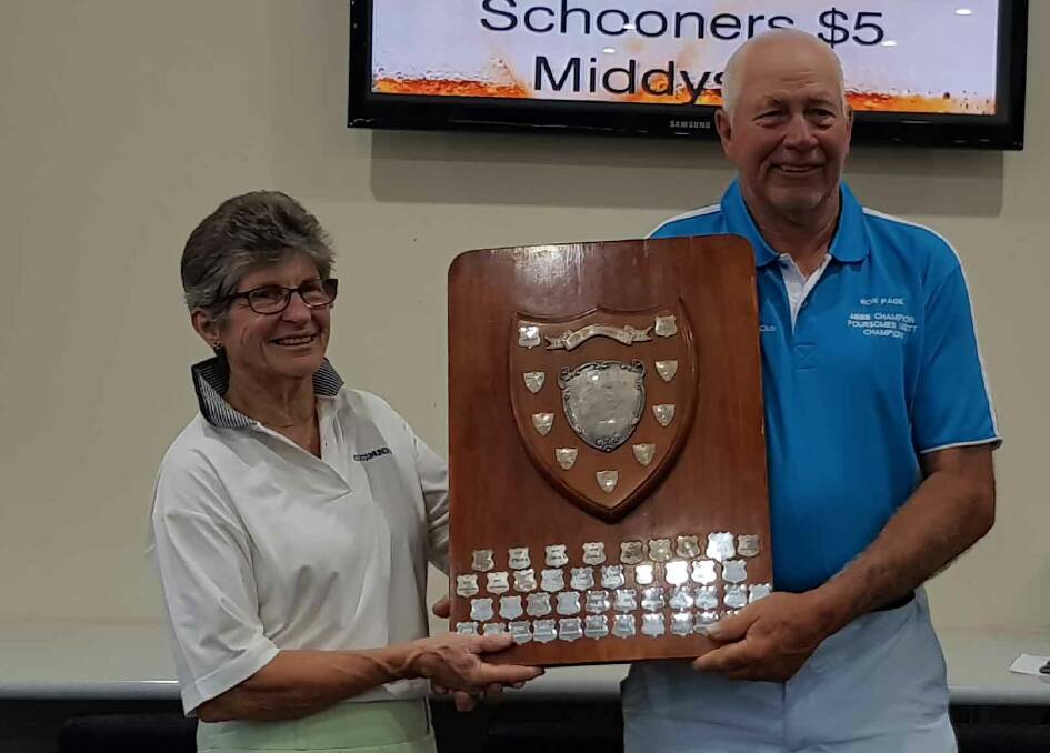 BIG WIN: Ron Page accepts the Scott Fuller Shield from Belinda Scott on behalf of all Harden golfers after the final round at Cootamundra on Sunday. Picture: Contributed