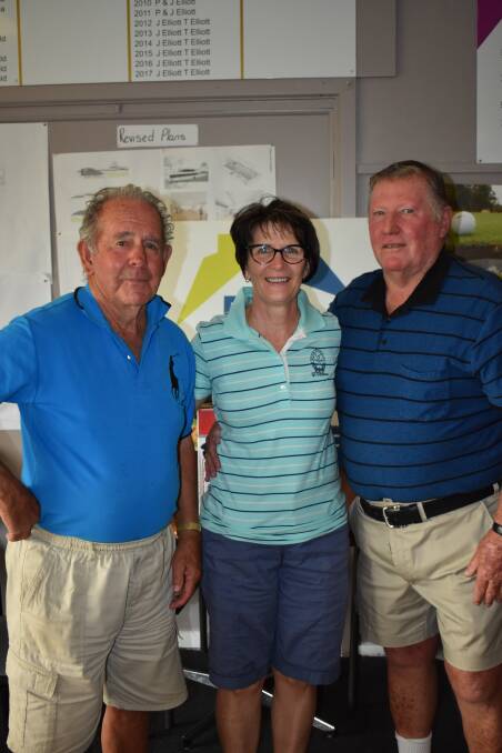 GOLF BUDDIES: Eric Kuhn, Jeanette Elliot and Bernie Parker at the Harden club last week. Picture: Jody Potts