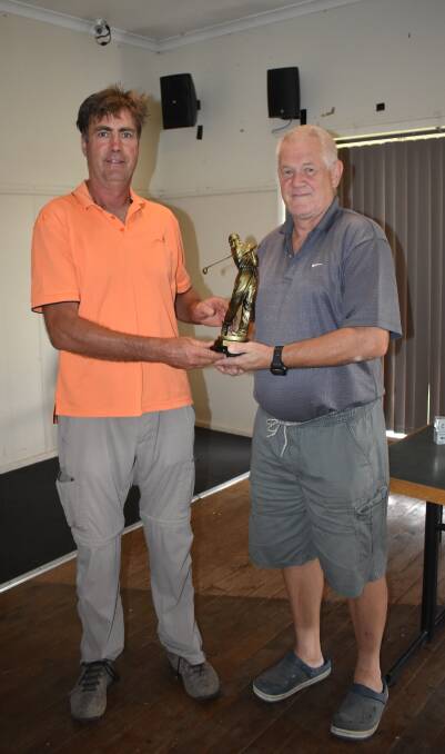 STABLEFORD WIN: Michael Baldry (left) presents the perpetual Cullinga Mines Gift to winner Kevin Hoppe on Saturday. Picture: Jody Potts
