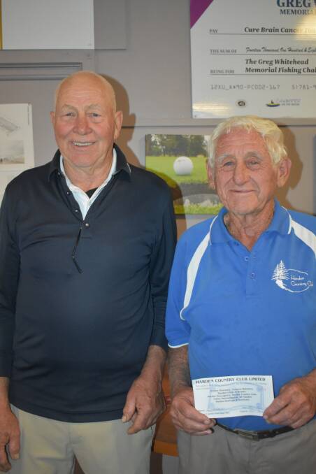 FAMILIAR FACES: Ron Page and Herby Manwaring at the 19th hole of the Harden Country Club last week. Picture: Jody Potts