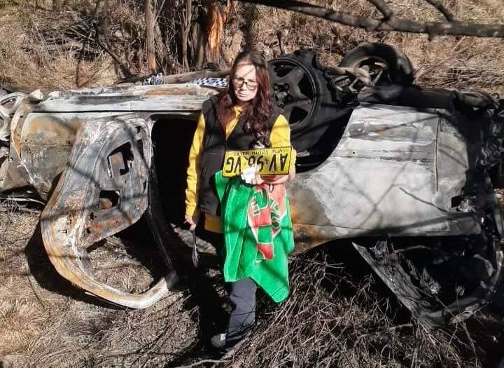 BURNED: Veronica Robertson at the scene of the crash. Photo: SUPPLIED.