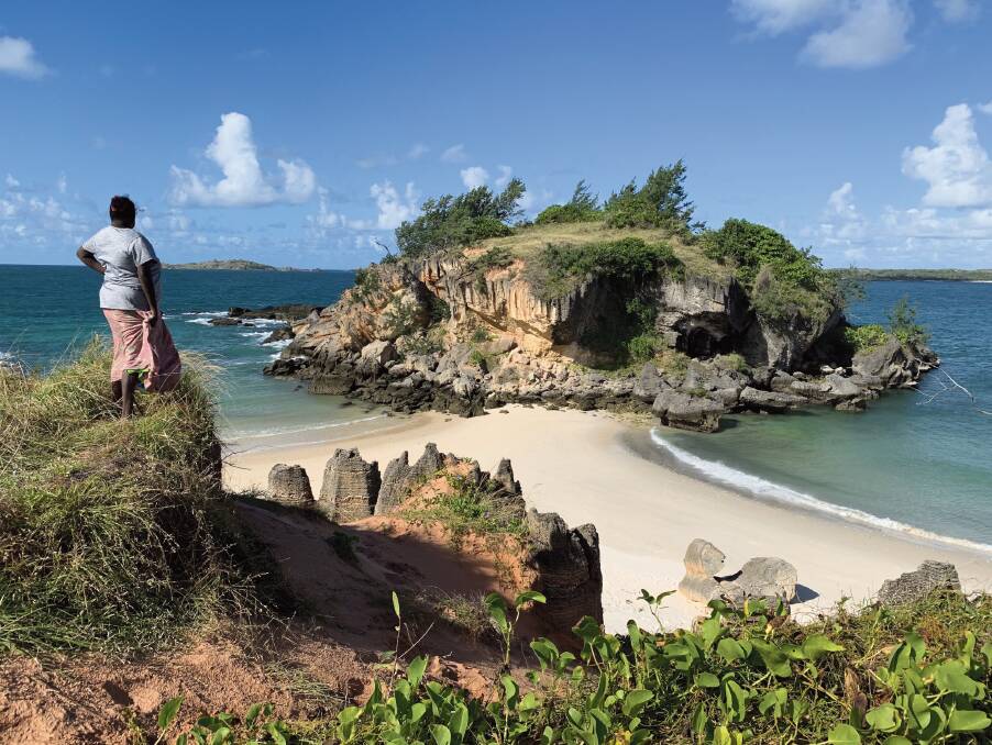 Rowena Munungurr scanning for crocodiles at Lonely Beach in Bawaka Homeland during a visit with Lirrwi Tourism. Image Angela Saurine. Rowena Munungurr scanning for crocodiles at Lonely Beach in Bawaka Homeland during a visit with Lirrwi Tourism. Image Angela Saurine.