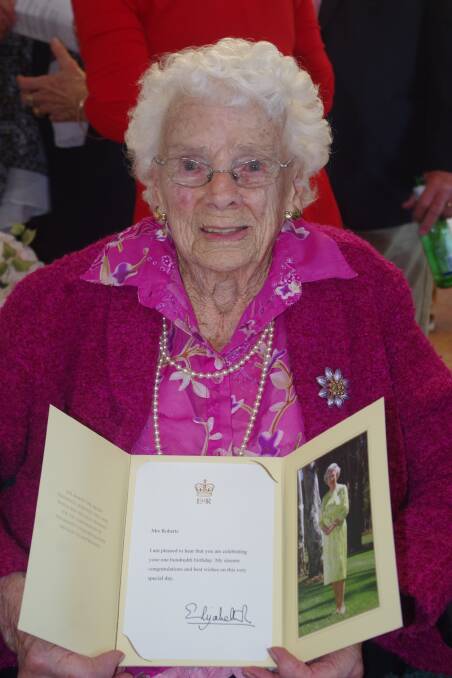 Birthday girl Brenda Roberts holding her telegram from Her Majesty, Queen Elizabeth II, at the first of her birthday parties held as St Lawrence last week.
