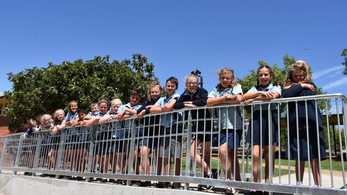 Students from Harden Murrumburrah Public School inspect the newly completed works. Photo: Peter Guthrie