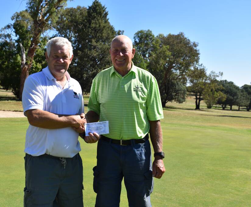 WINNER: Kevin Hoppe, pictured with Ron Page, took out Saturday's club trophy stableford event at Harden Country Club. Hoppe returned to the clubhouse with a score three better than his handicap. Picture: Jody Potts