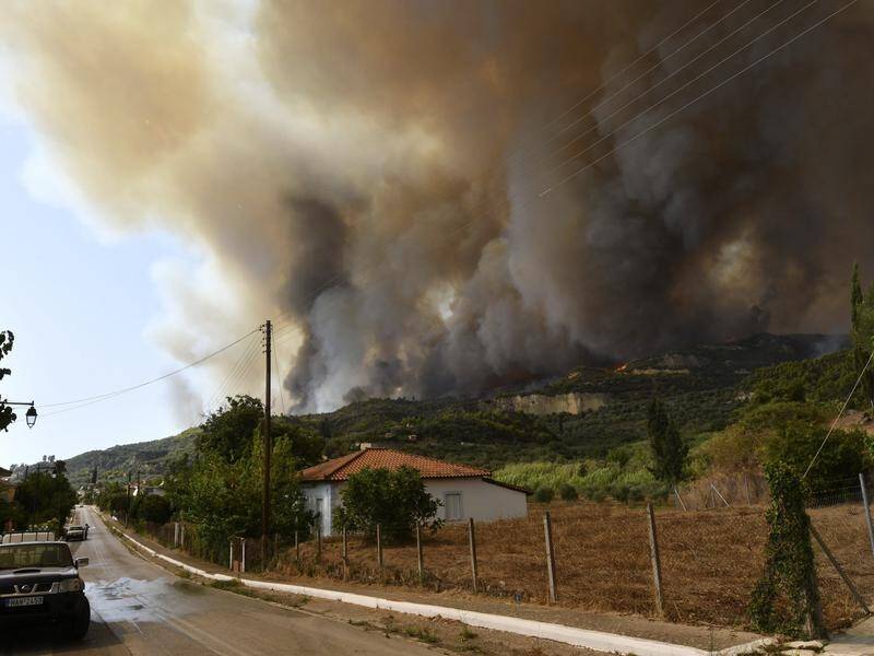 Greek officials have ordered Olympia's residents to leave the village amid wildfires.