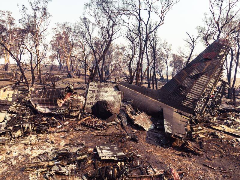 Police have released images of the wreckage of a firefighting plane that crashed in southern NSW.