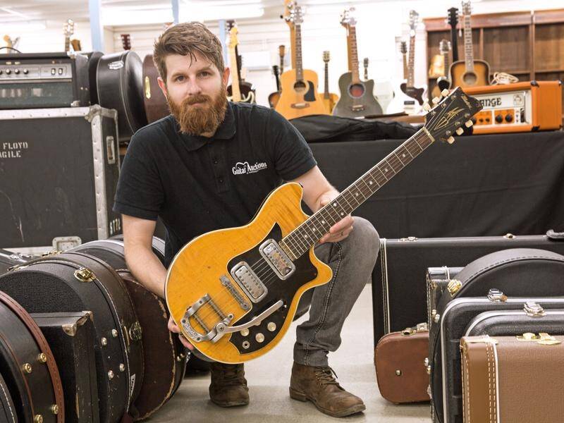 George Harrison's Australian-made Maton guitar is going up for auction in England.