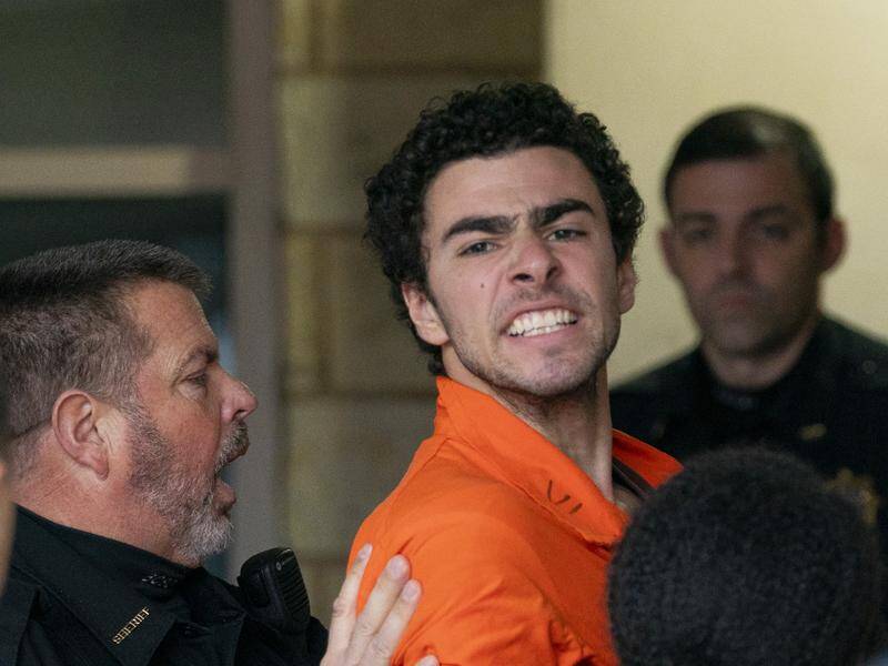 Luigi Mangione will remain in jail in Pennsylvania, where he faces gun and forgery charges. Photo: AP PHOTO