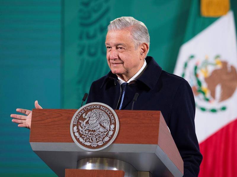Mexican President Andres Manuel Lopez Obrador says he has a sore throat after getting COVID-19.