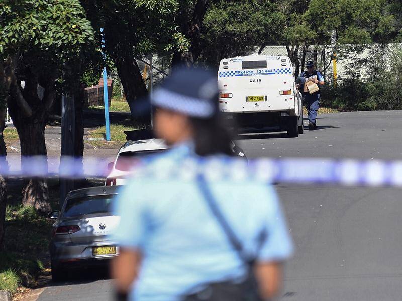 Police set up at a crime scene after finding a burnt-out car in Beverley Hills in Sydney. Photo: Steven Saphore/AAP PHOTOS