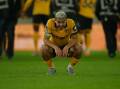 Brazilian Andre seems to sum up the misery at Wolves after their most recent loss to Man Utd. Photo: AP PHOTO