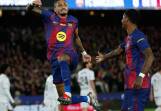 Two-goal star Raphinha celebrates after scoring in Barcelona's win over Osasuna. Photo: AP PHOTO