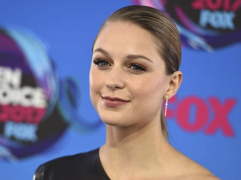 Supergirl actor Melissa Benoist says she was the victim of domestic violence by a former boyfriend.
