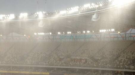 Lightning and drenching rain delayed the start of the BBL game at Optus Stadium. Photo: Richard Wainwright/AAP PHOTOS