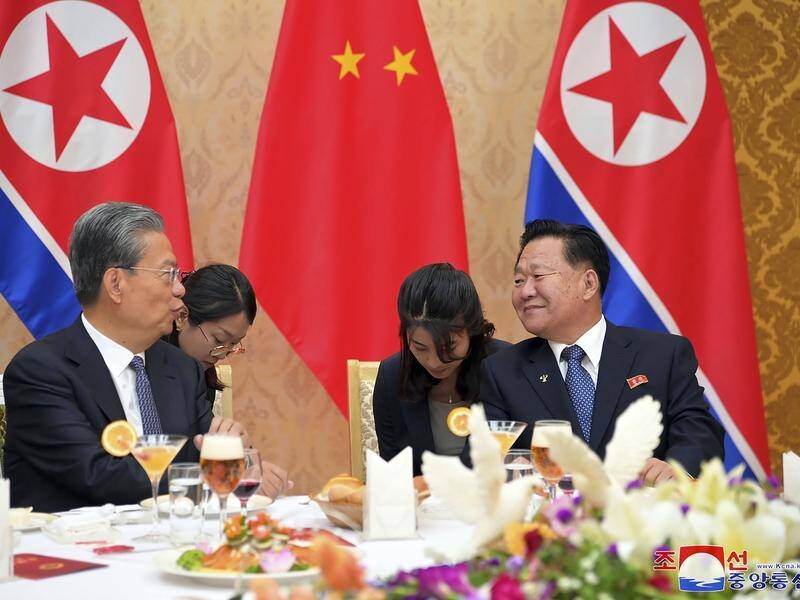 North Korea's Choe Ryong Hae (right) has held talks with China's Zhao Leji in Pyongyang. (AP PHOTO)