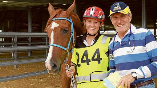 Rochelle Knibinicki, from Mudgee, was happy after her horse 'Velona Amadi' was cleared by Yass veterinarian and rider Simon Bain after the endurance ride on Saturday. 