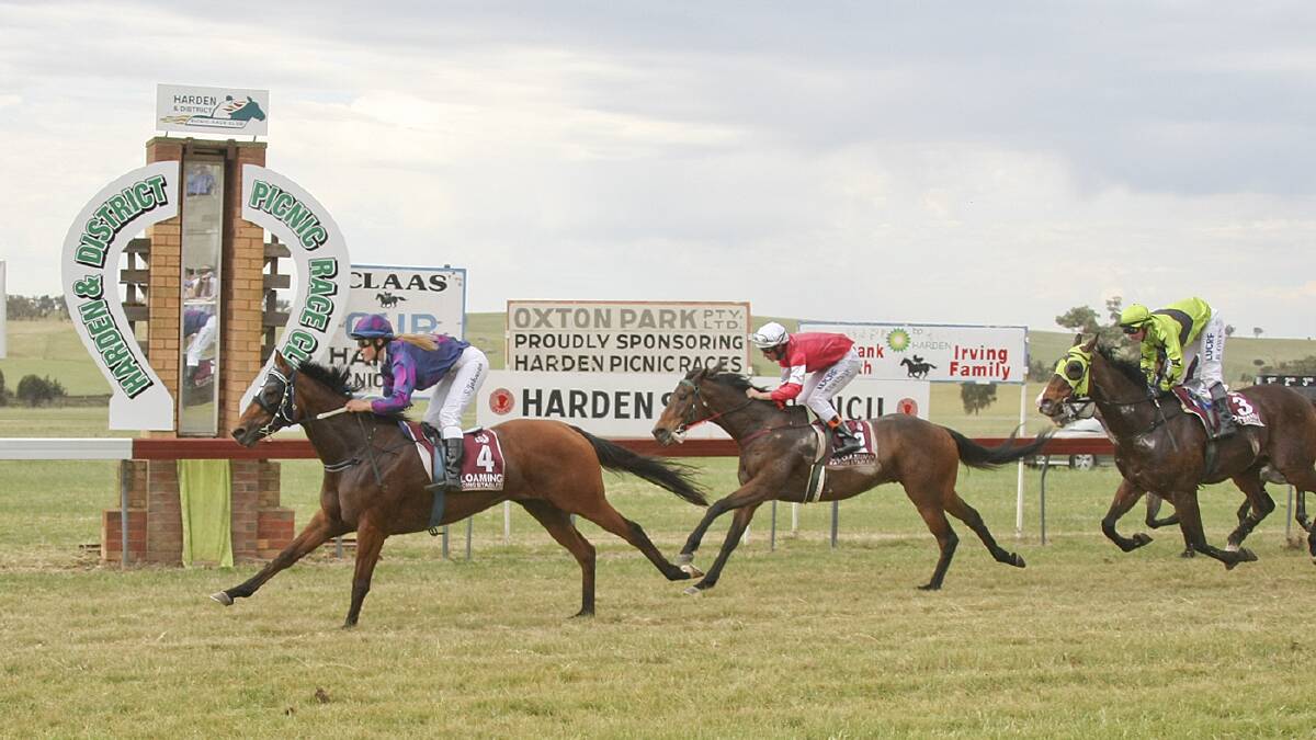 Samara Johnson rides the Brad Witt trained Pointing to Gold past the winning post to take out this year's Claas Harvest Centre Wagga Harden Picnic Cup on Saturday ahead of Poker Pro and Gold Arena.