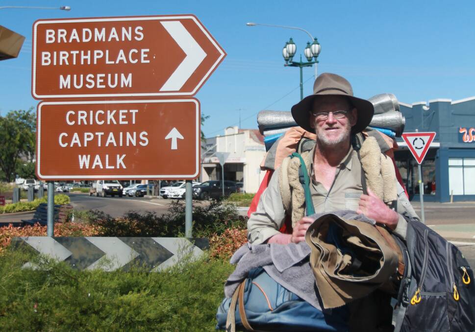 THE HIGHWAYMAN: John Cadoret stopped over in Cootamundra on Tuesday and will be walking towards Bathurst using the Olympic Highway. Photo: Declan Rurenga