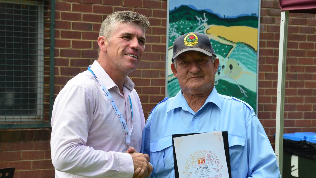 Harden's Citizen of the Year Les Cameron with Australia Day Ambassador Mark Warren. Photo: Susie McDonell